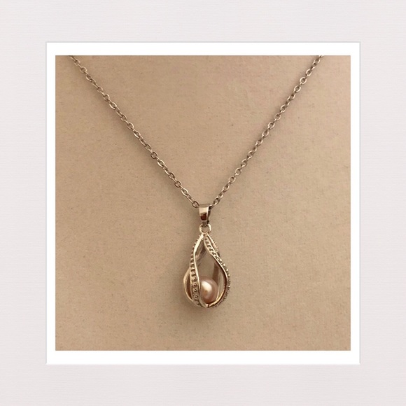 Genuine Freahwater Pearl in Caged Pendant - Picture 2 of 3